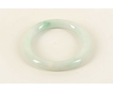 A He Tian jade bangle.