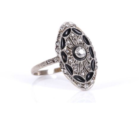 An Art Deco white gold, diamond and enamel panel ring.