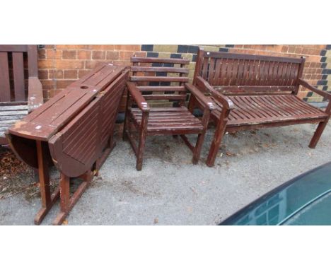 A folding circular wooden garden table with a wooden slatted bench and single chair (3)