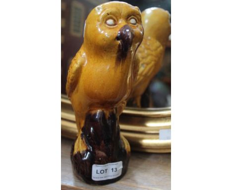 A probable Chinese mustard &amp; brown ceramic owl figure