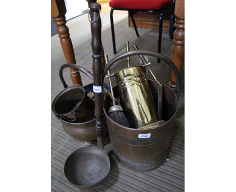 A selection of fireside tools, copper pans, etc
