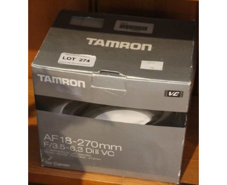 A Tamron AF18-270mm camera lens in original box