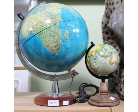 A modern light up globe, together with a smaller example on plinth (2)