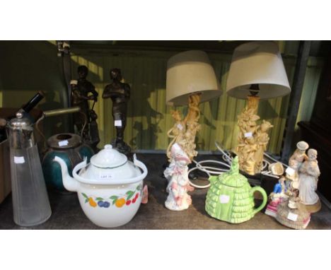 A shelf containing a wide selection of ceramic and other items&nbsp;