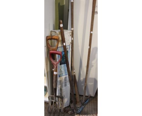 A selection of garden hand tools with wooden shafts with a garden gazebo boxed