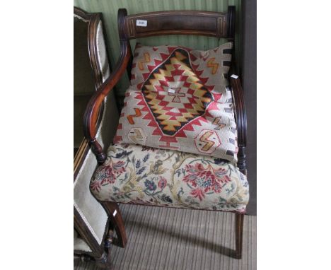 A tapestry upholstered seated armchair, with cushion