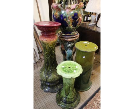 A collection of four jardinire stands and one pot a/f Condition: Jardiniere planter pot - cracked, crazed and has loss to foo
