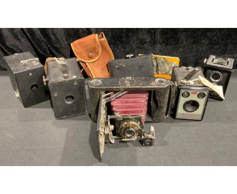 Photography - A No. 3 Model G Folding Pocket Kodak camera, red leather bellows; An Ensign Ful-Vue 120 roll film camera (early