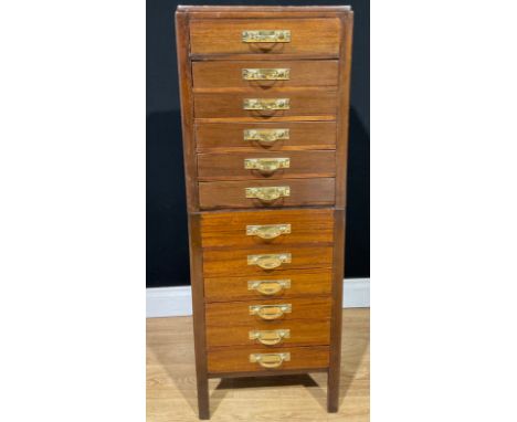 A set of mahogany drawers, the cross banded caddy top above two sets of six graduated dovetailed drawers, brass handles, 123.