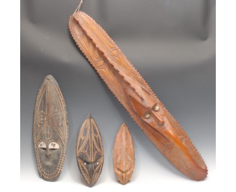 Tribal Art and the Eclectic Interior - a Papua New Guinea mask, carved with crocodile (pukpuk) imagery, cowrie shell eyes, 10