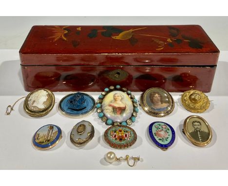 A 19th century portrait miniature brooch, oval portrait panel painted with a lady with ringlets, Pinchbeck type oval mounted,