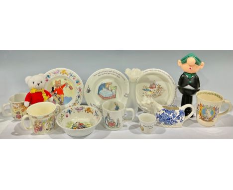 A Wedgwood Peter Rabbit nursery set, comprising bowl, eggcup, plate and mug; a Royal Doulton Bunnykins two handled mug; a Wed