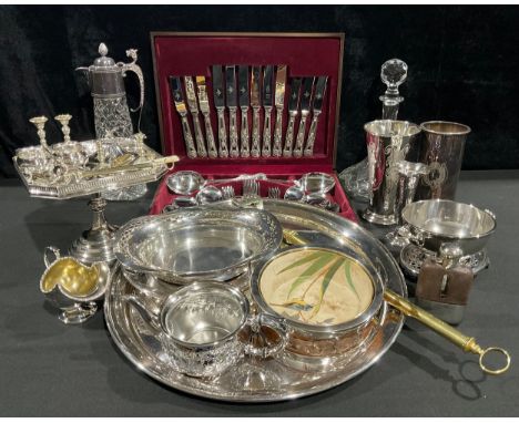 A silver plated pedestal comport, galleried canted square top; an EPNS mounted claret jug; an EP mounted oak butter dish with