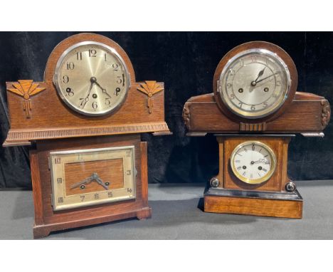 An early 20th century French mantel clock, architectural ebonised and inlaid case, white enamel dial, Roman numerals, twin wi