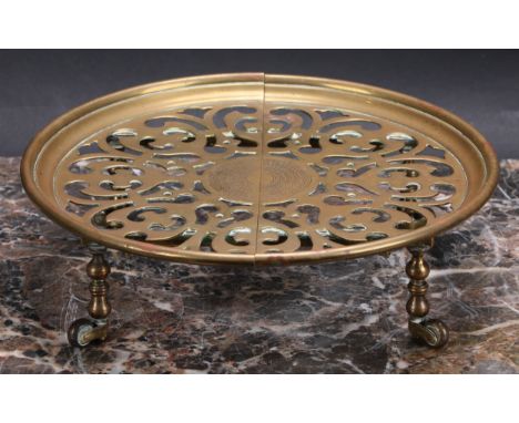 An unusual 19th century brass extending table coaster trivet or dish standthe pierced plateau with engine turned centre, bras