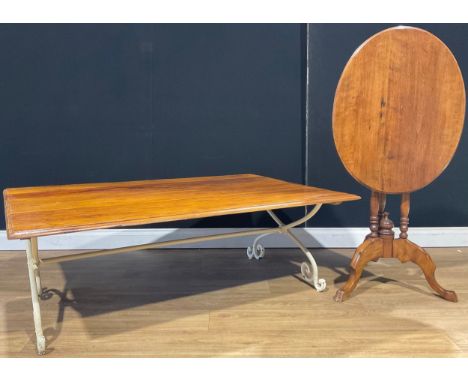 A cast iron x-frame table, the oak top with six panels, scroll feet, 46cm high, 90.5cm wide, 135cm long; an oak tilt top tabl