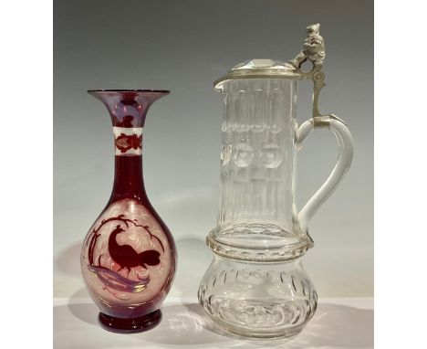 An early 20th century Bavarian cut glass ale jug or pitcher, pewter mounted, the thumb piece as gnome with jug of ale, 33cm h