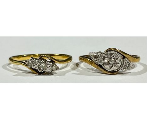 An 18ct gold and platinum illusion set diamond ring, size K, missing one small stone, 1.8g; another similar, size L, 1.9g (2)