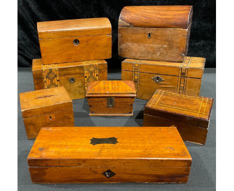 A Victorian walnut and parquetry rectangular tea caddy, 20cm wide, c.1860; another similar; a dome topped tea caddy; a 19th c