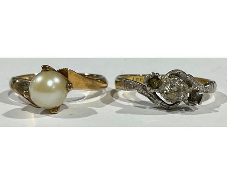 A 9ct gold simulated pearl ring, size J/K, 2.4g; a 9ct gold ring, two stones missing, size K, 2.3g (2) 