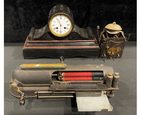 A 19th century French black marble mantel clock, c.1880; a two-train clock movement; a Protectorgraph mechaical cheque writer
