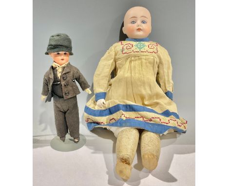 Toys &amp; Juvenalia - a bisque shoulder head doll, the bisque head inset with weighted sleeping blue glass eyes, painted fea