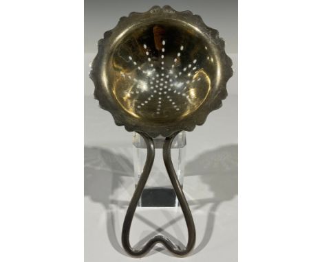 An Art Deco period silver tea strainer, Birmingham 1944 