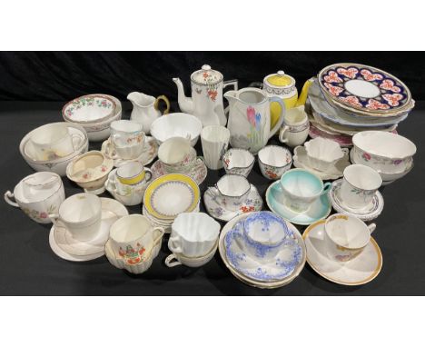 A quantity of Shelley, Wileman &amp; Co. and Foley teaware, late 19th century and later, various shapes and patterns, part se