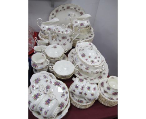 Over Sixty Pieces of Royal Albert 'Violetta' Tea and Dinner ware, comprising tureen,eleven dinner plates, teapot, cups, sauce