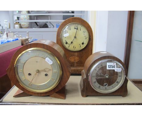 An Early XX Century American Oak Inlaid Mantle Clock "Gilbert", white dial, stepped base, gilded brass bun feet, together wit