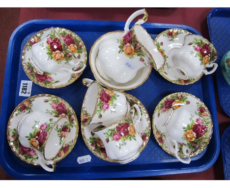 Royal Albert 'Old Country Roses', six tea cups and saucers, jug and sugar bowl, all first quality.