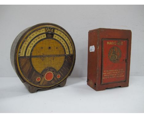 A Tinplate Money Box, in the form of a  circular 1930's radio, along with a magic safe, money box by Anfoe (both have patinat