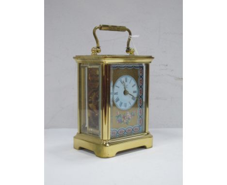 A Halcyon Days Enamels Brass Carriage Clock.