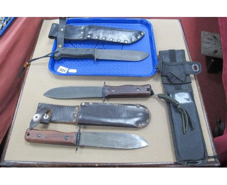 Wilkinson Sword Survival Knives (x 2); plus one other similar, all in sheaths. (3)