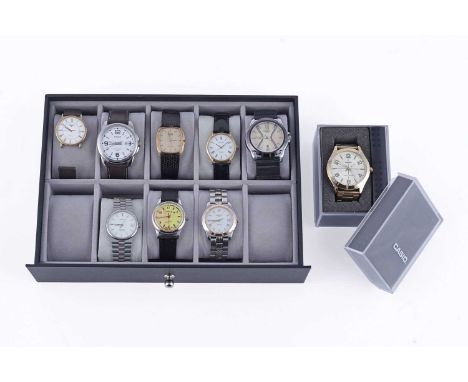 A selection of wristwatches by Longines, Casio, Tissot and Oris. (9)