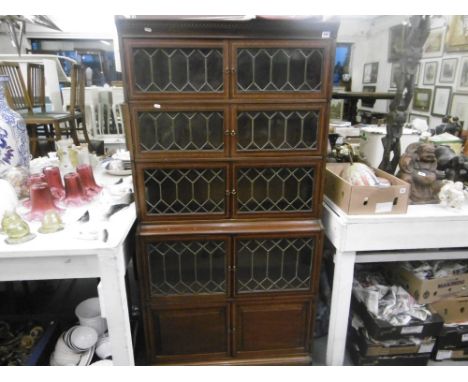 A LEADED LIGHT GLOBE WERNICKE STYLE BOOKCASE