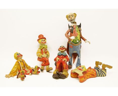 A set of five signed paper mache model clowns, with hand painted detailing