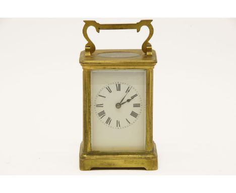 A small French brass carriage clock, R & Co, Paris, 15cm high