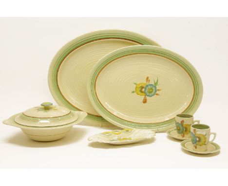 A Clarice Cliff Honeyglaze pattern part service, comprising of two meat plates, a shaped dish, a tureen, cover and two coffee