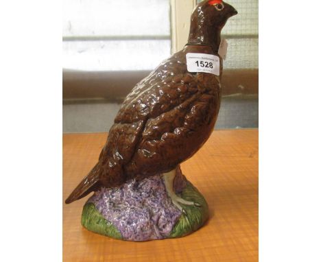 Royal Doulton Famous Grouse Scotch whisky bottle in the form of a grouse 
