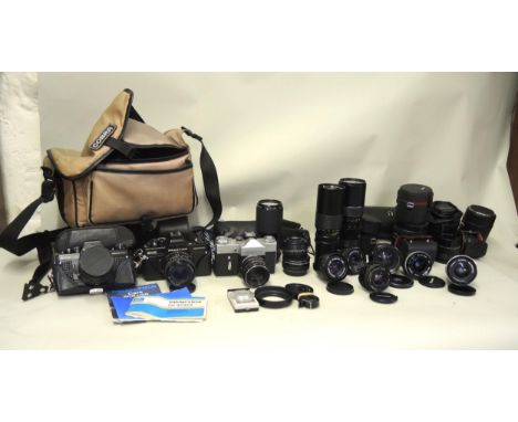 Two Practika cameras, Zenith camera and a quantity of various lenses 