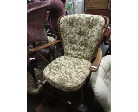 Pair of Ercol comb back sitting room chair framesThe webbing is brittle and would need replacing very soon. 