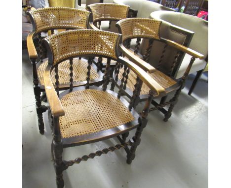 Set of four early 20th Century beechwood tub shaped drawing room chairs, the cane backs and seats divided by barley twist upr