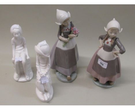 Pair of Lladro figures of young Dutch girls holding tulips, together with a pair of Spode figures 