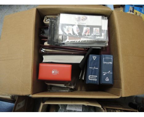Two boxes containing a large quantity of miscellaneous stamps and First Day covers 