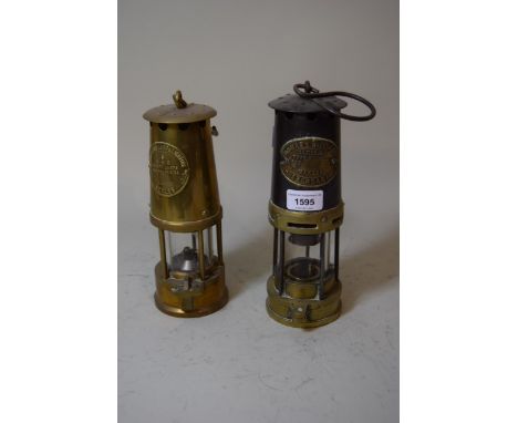 Brass and steel miner's safety lamp by Thomas & Williams, Aberdare, together with another by Protector Lamp and Lighting, Ecc