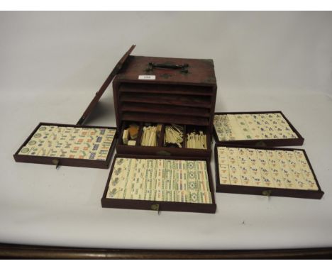 Composite and bamboo Mahjong set, housed on a wooden case 