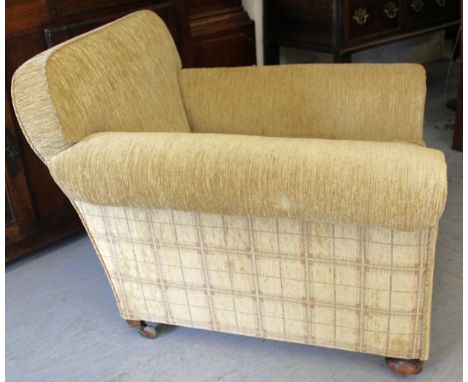 Gentleman's late 19th Century library armchair with loose cushion, on bun supports with original brass and ceramic casters (f