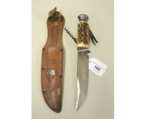 Small Continental hunting knife by Fagan, the stag horn grip incorporating corkscrew etc. with the original leather sheath 