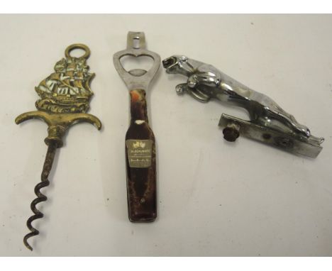 Jaguar car mascot, advertising bottle opener and a corkscrew 